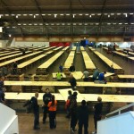 View from the escalators at Hall D, most of the tables already built.